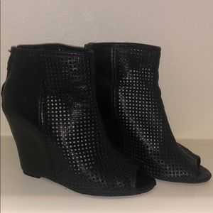Black bootie by ASH. Purchase from Saks